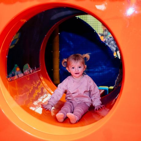 little girl in obstacle at play valley